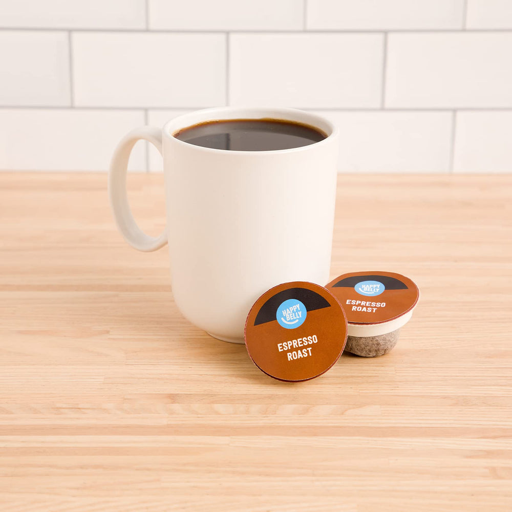 Close-up of Happy Belly espresso roast pods highlighting dark roast
