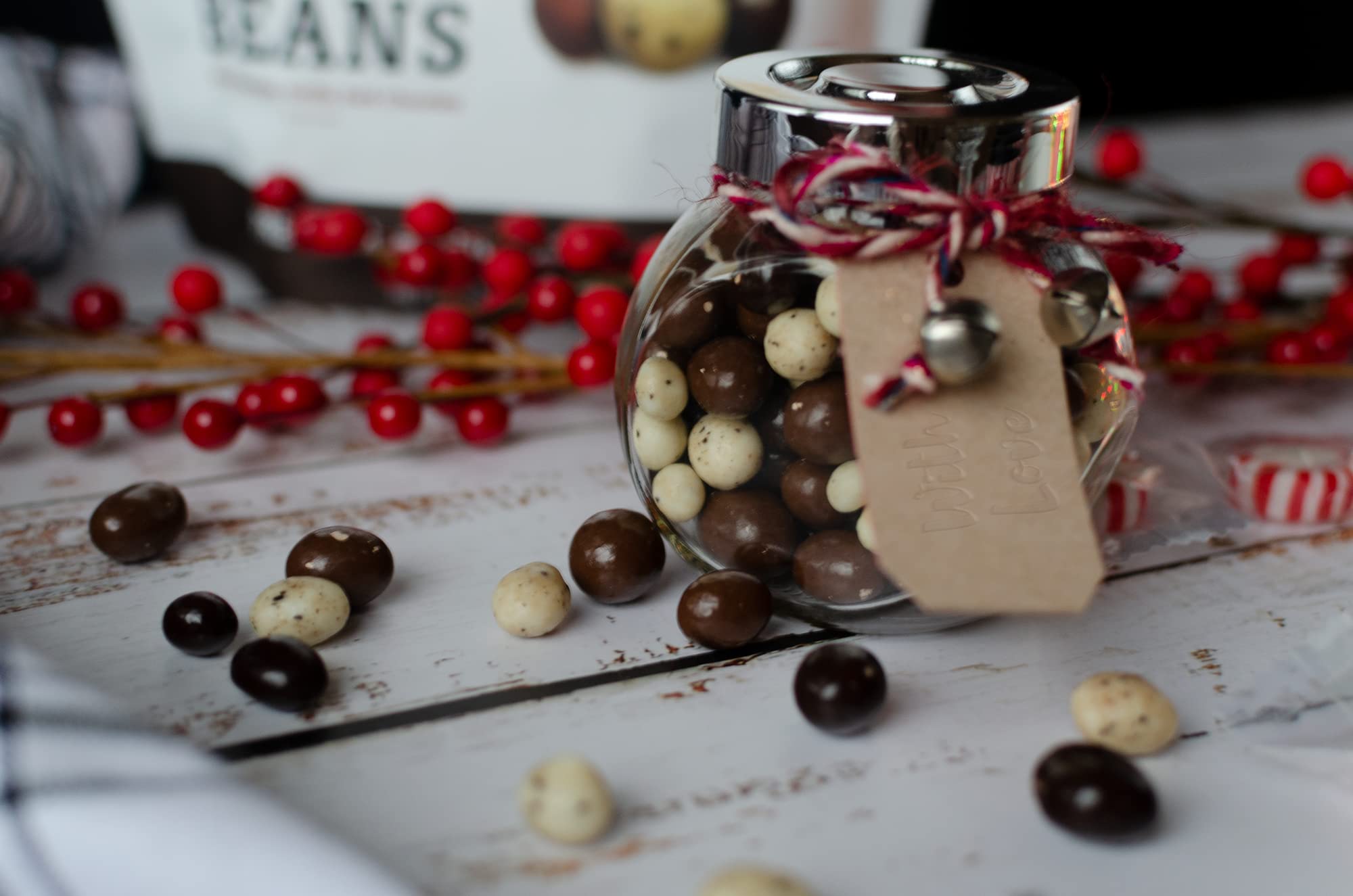 Close-up of Happy Bites coffee beans with glossy chocolate coating.