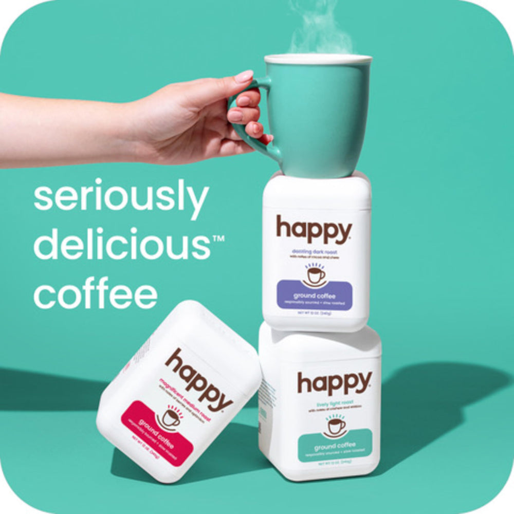 We Are Happy coffee light roast scoop in use for quick mornings