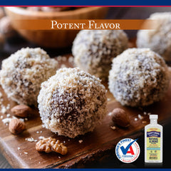 Close-up of Happy Home almond flavoring liquid with natural almond notes.