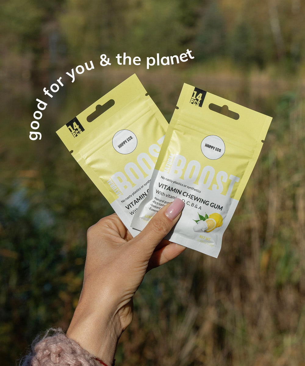 HAPPY ECO xylitol gum non-GMO ingredients shown on packaging.