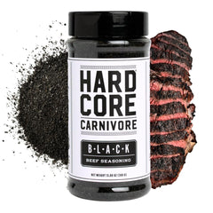 Hardcore Carnivore Black bottle front view, premium charcoal rub for bold steaks.