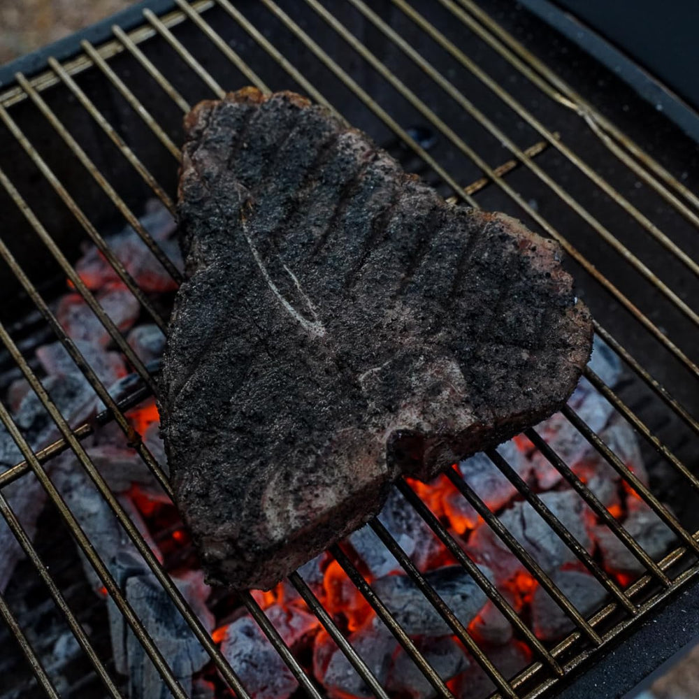 Hardcore Carnivore Black rub on ribs for bold taste.