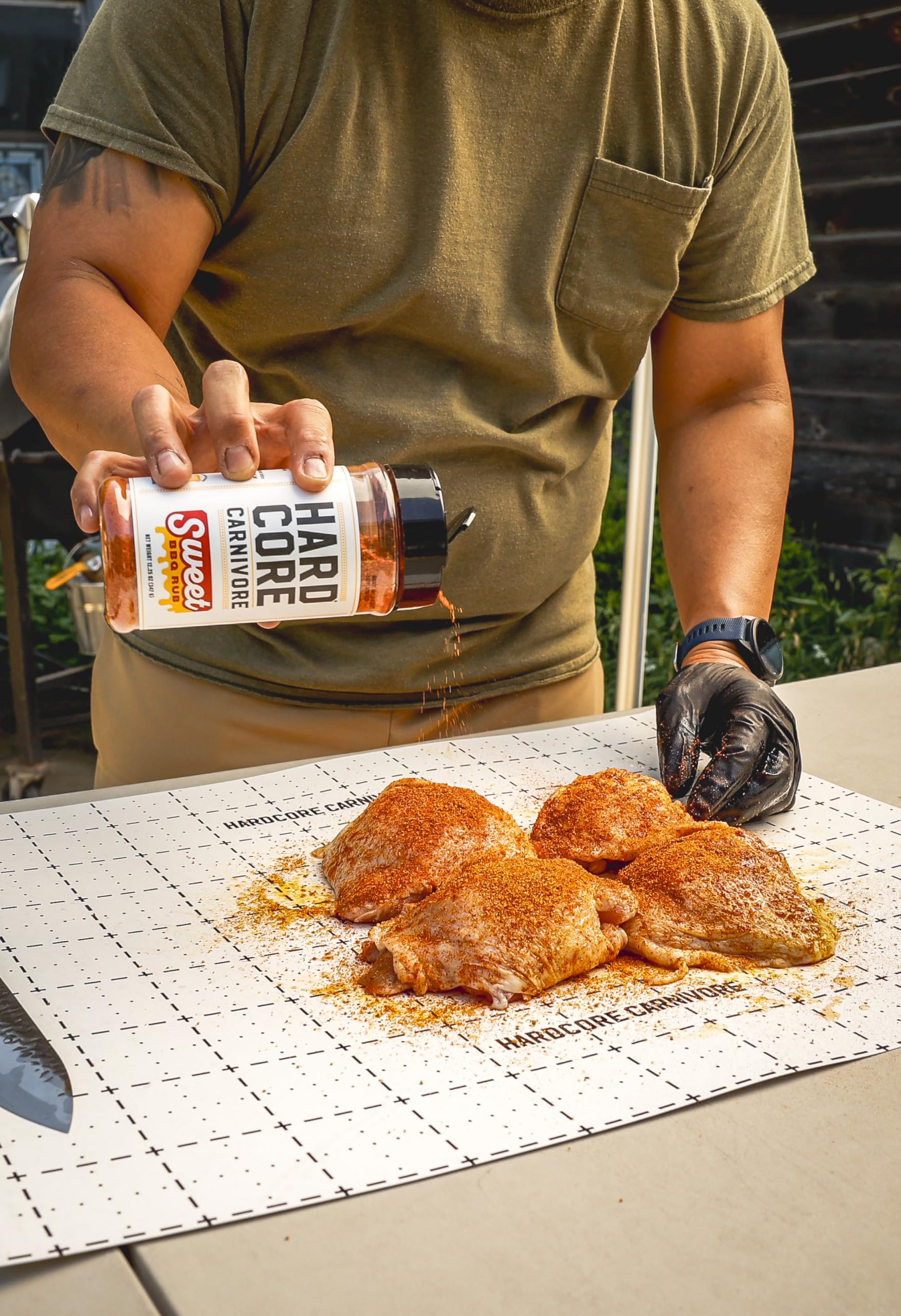 Hardcore Carnivore Sweet BBQ Seasoning on a grill setup for easy seasoning