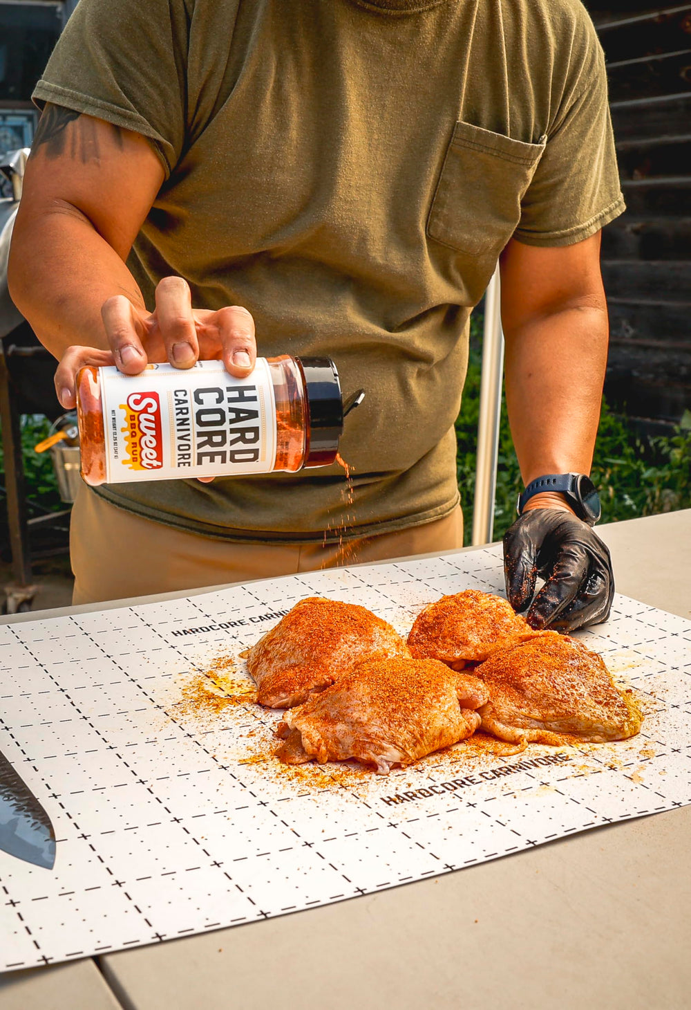 Hardcore Carnivore Sweet BBQ Seasoning on a grill setup for easy seasoning