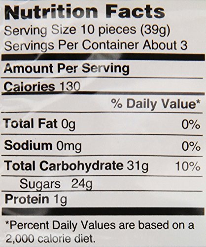 HARIBO Ginger-Lemon gummies close-up reveal soft bite and glossy surface.