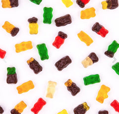 Colorful Goldbears in a bowl invite party snacking and sharing.