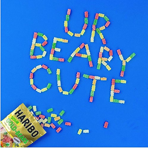 HARIBO Goldbears sour strawberry bears, vibrant colors for dessert toppings.