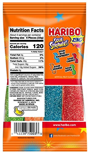 Haribo Z!NG Sour Streamers closeup shows tangy crystals and stretchable texture for snacking.
