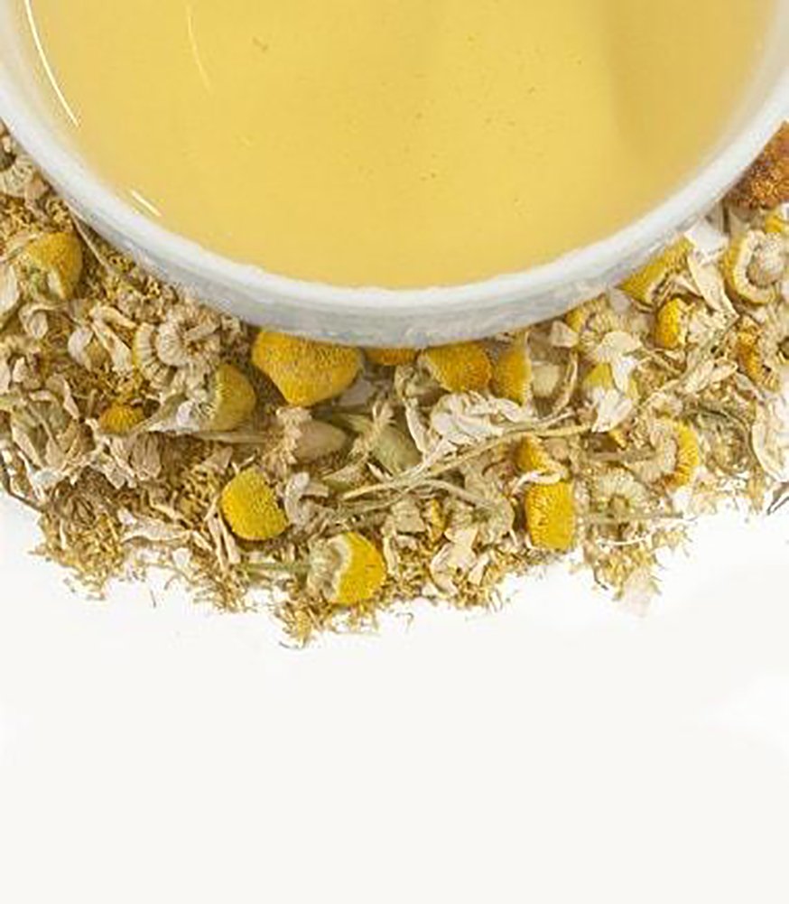 Cup of Harney & Sons Chamomile tea steeping with calming aroma.
