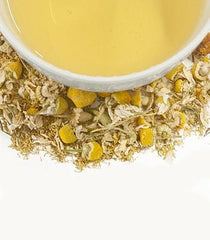 Cup of Harney & Sons Chamomile tea steeping with calming aroma.