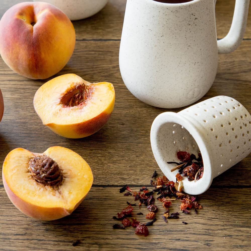 Harney & Sons Peach Fruit Tea orange-peel and fruit mix, colorful caffeine-free tea visuals.