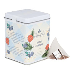 Close up of Berry Cobbler sachets highlighting convenient, caffeine-free flavor