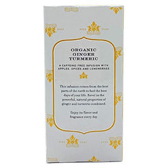Harney & Sons Ginger Turmeric brew in a mug with ruby color and aroma.