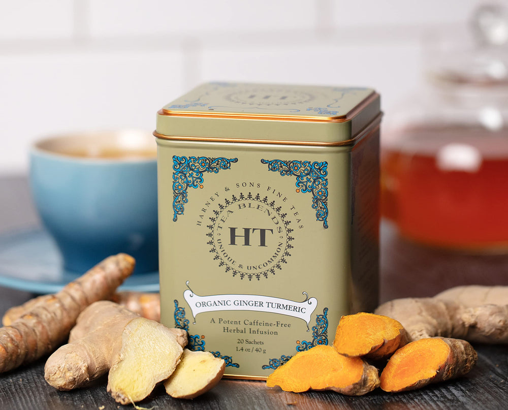 Harney and Sons HT Organic Ginger Turmeric Tea cup showing warm ruby brew
