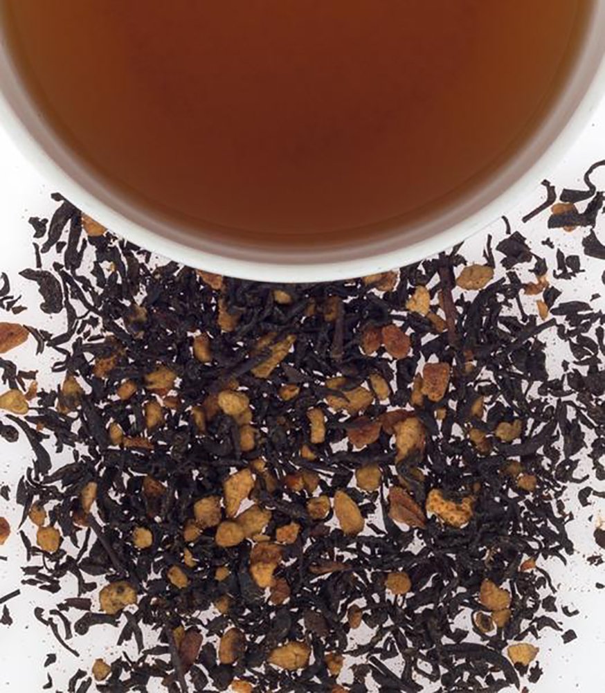 Harney and Sons Hot Cinnamon Spice tea tin and cup, inviting aromatic, comforting moments.