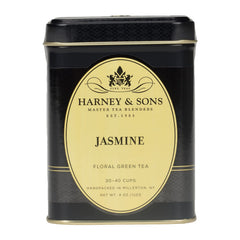 Harney & Sons Jasmine pouchong tea leaves close-up, highlighting the earthy base.