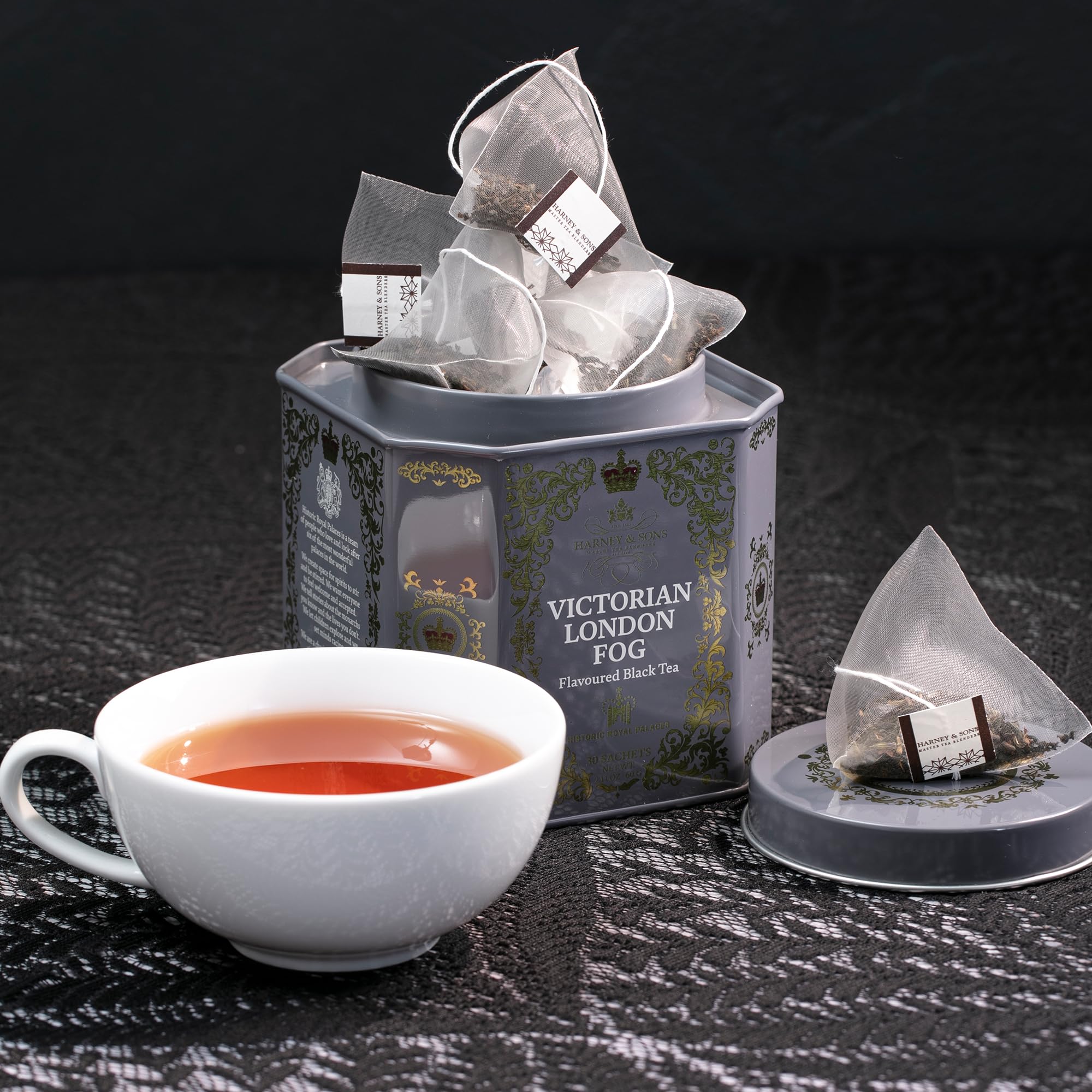 Tea being poured with steam, perfect for a cozy London moment.