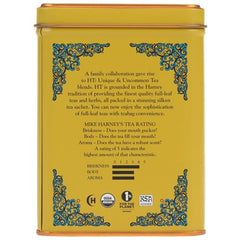 Close-up of Harney & Sons Organic Ginger Lemon Tea with ginger slices signaling warm spice.