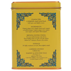 Lemon zest and tea leaves highlight brightness in Harney & Sons Organic Ginger Lemon Tea.
