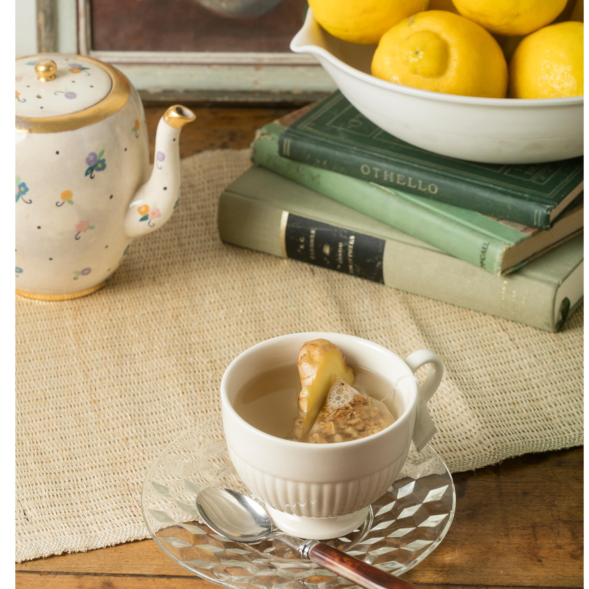 Serving a cup from Harney & Sons Organic Ginger Lemon Tea, showcasing easy brew and aroma.