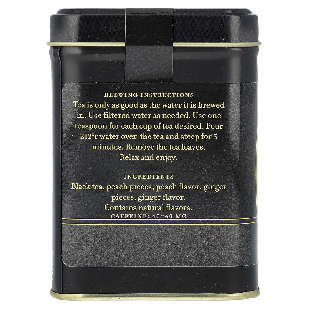 Harney & Sons Peaches & Ginger loose tea brewing in a cup, inviting fragrance and flavor.