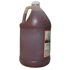  Harold's Chicken Mild Sauce bottle pour, perfect for batch cooking and sharing.