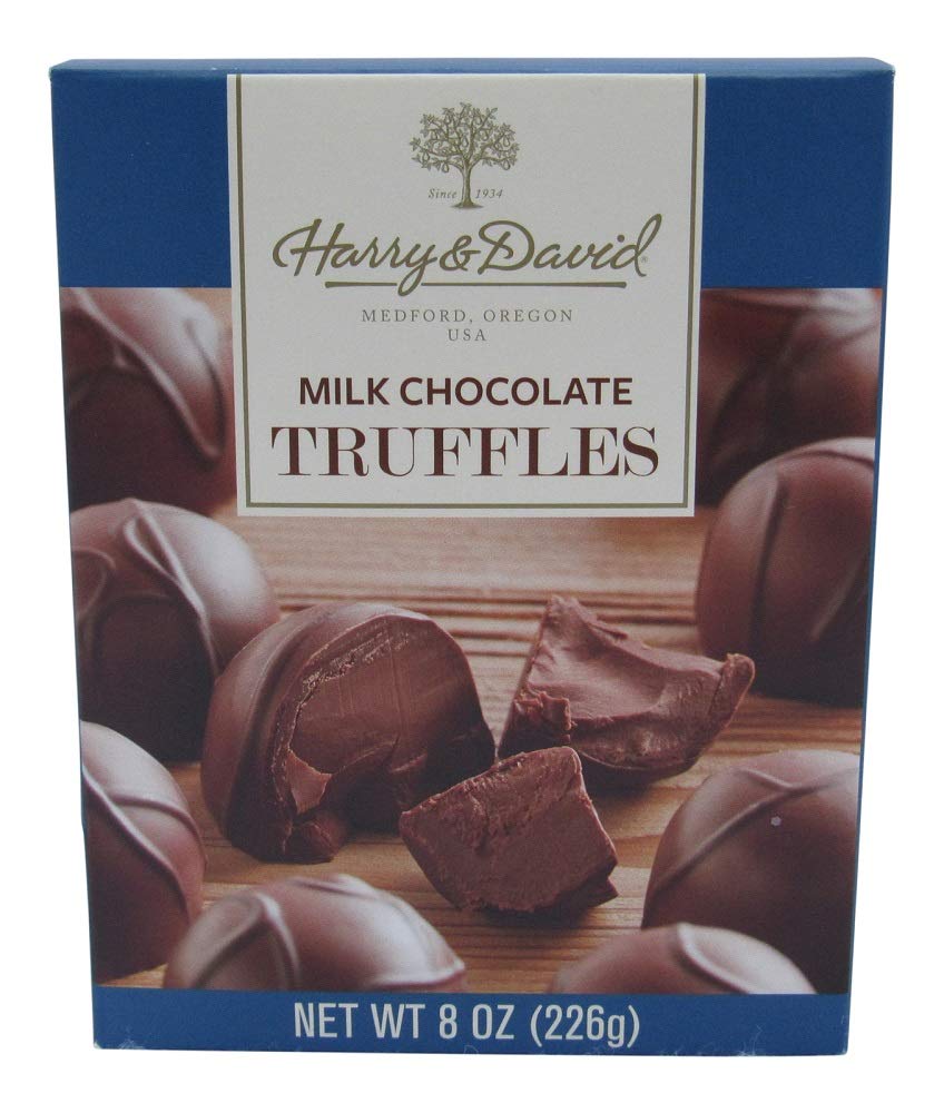 Harry & David milk chocolate truffles in an 8-ounce gift box, ideal for gifting.