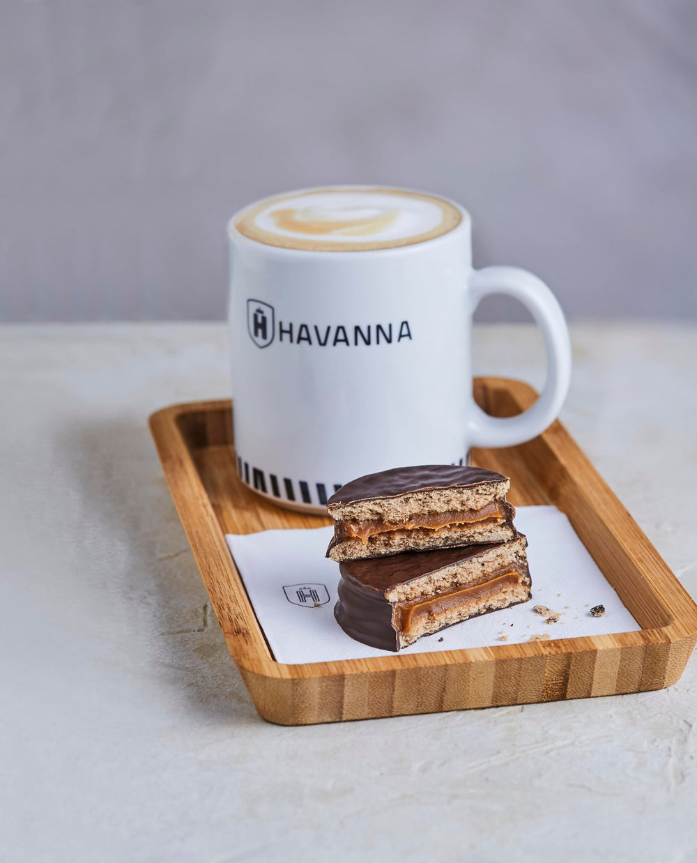 Havanna Alfajores Argentinos semi-sweet chocolate glaze close-up, glossy finish