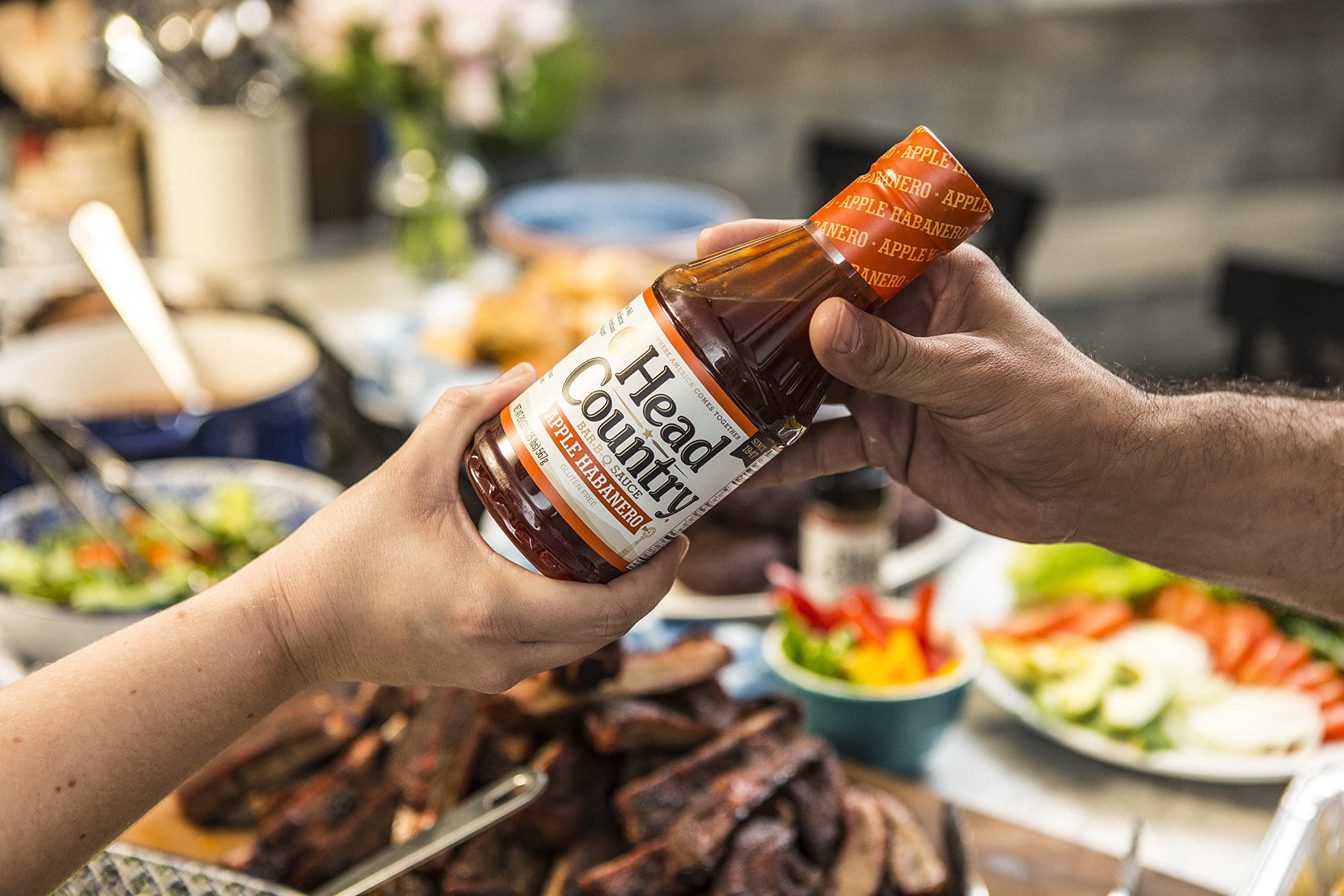 Head Country Apple Habanero BBQ Sauce glaze on ribs adds sweet heat and color