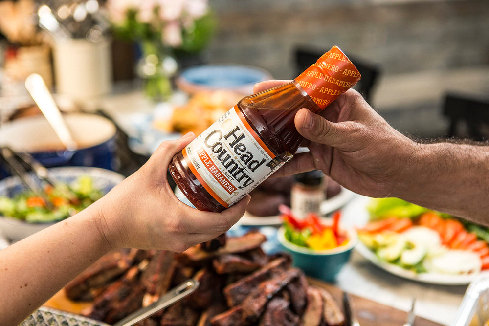 Head Country Apple Habanero BBQ Sauce glaze on ribs adds sweet heat and color
