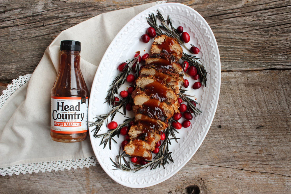 Head Country Apple Habanero BBQ Sauce marinating chicken for flavorful results