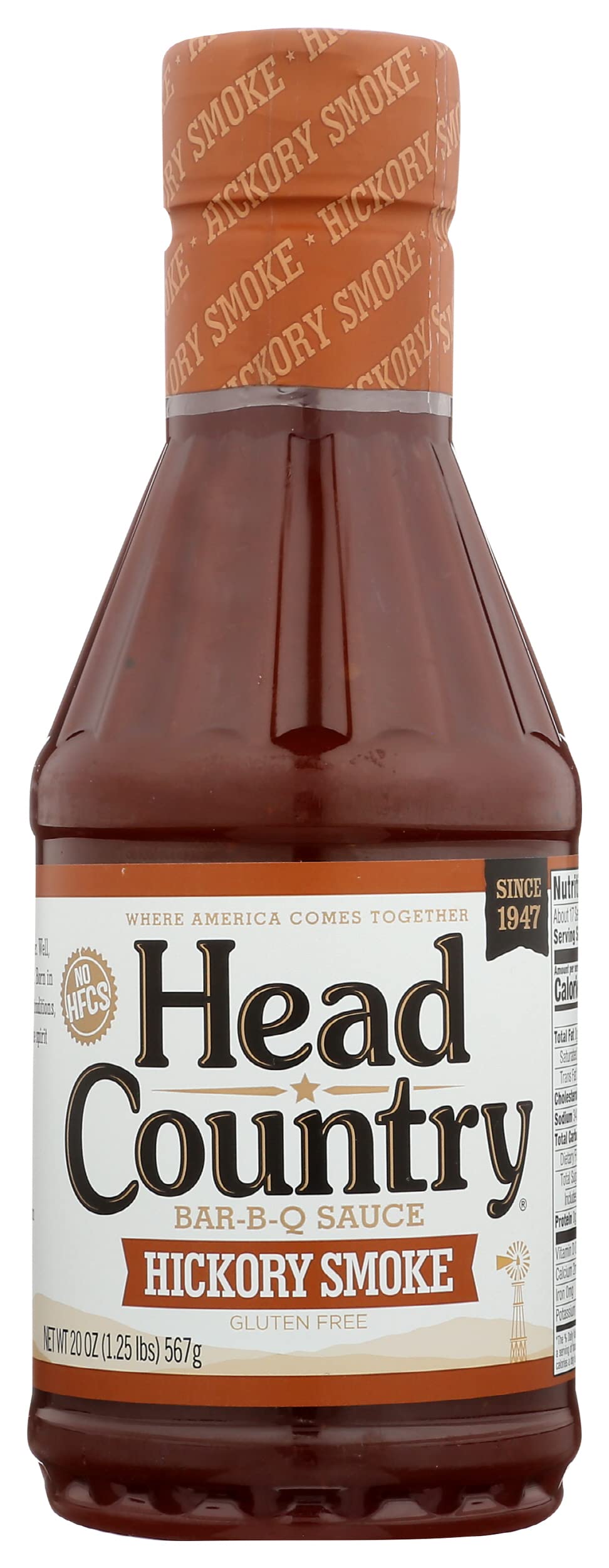 Head Country Hickory Smoke sauce bottle pour for rich, smoky flavor at home