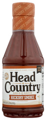 Head Country Hickory Smoke sauce bottle pour for rich, smoky flavor at home