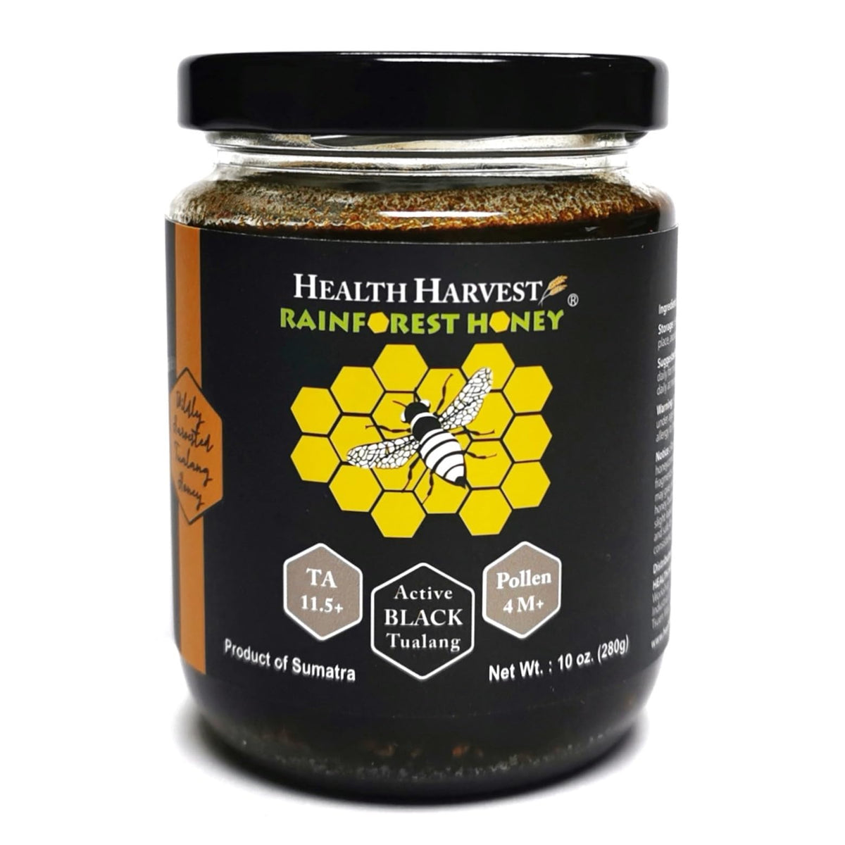Health Harvest Tualang Honey jar close-up, raw and unfiltered, rich amber color.