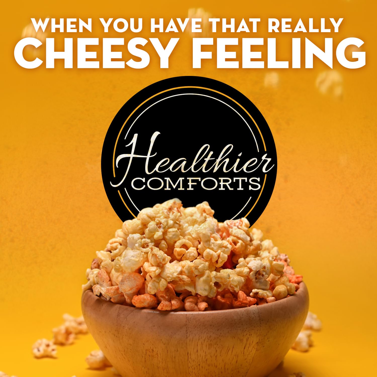 Healthier Comforts cheddar cheese powder 7oz over popcorn for flavor finishing dust.