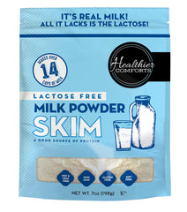 Healthier Comforts lactose-free skim milk powder packaging on shelf.