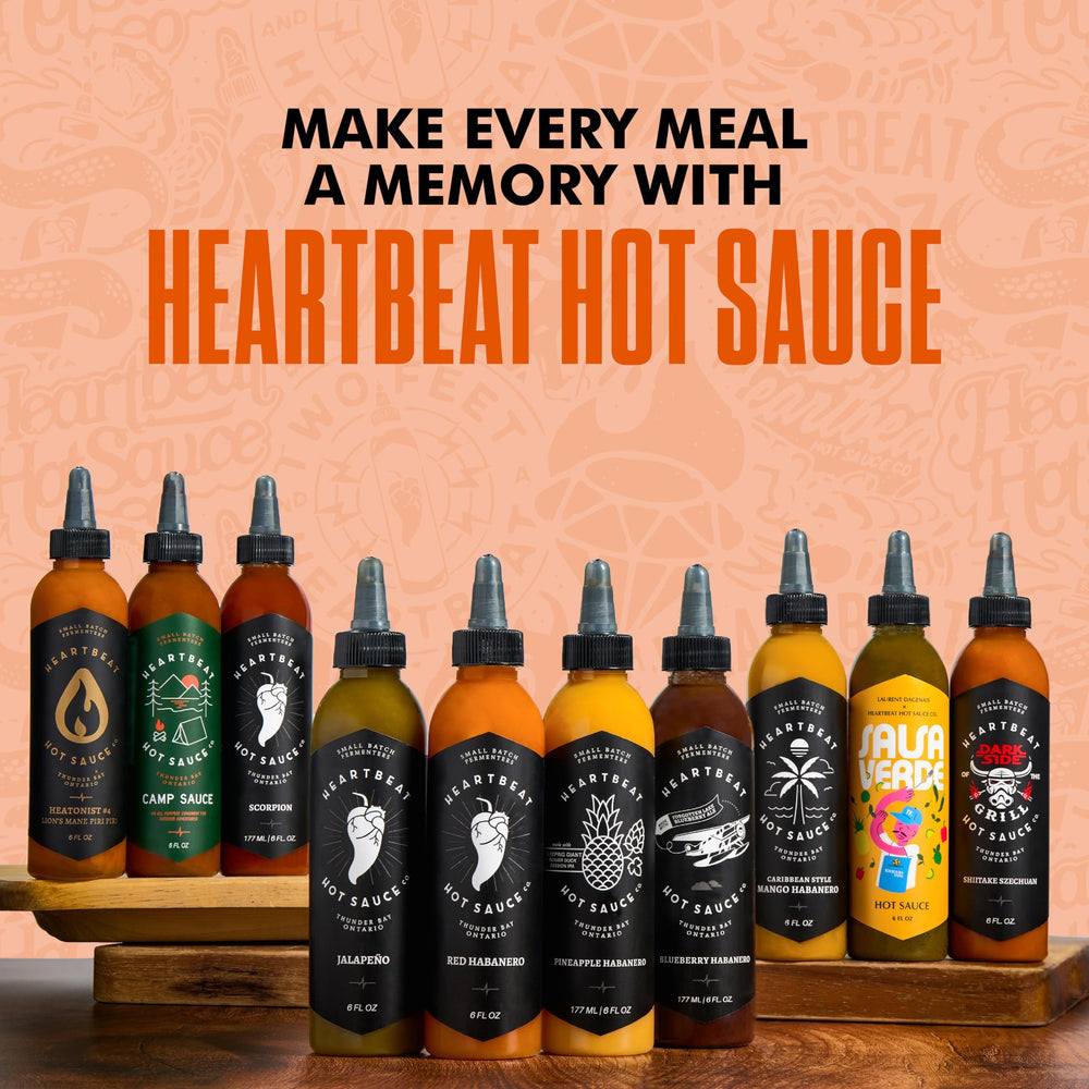 Heartbeat Mango Habanero bottle against background ready to spice sauces.