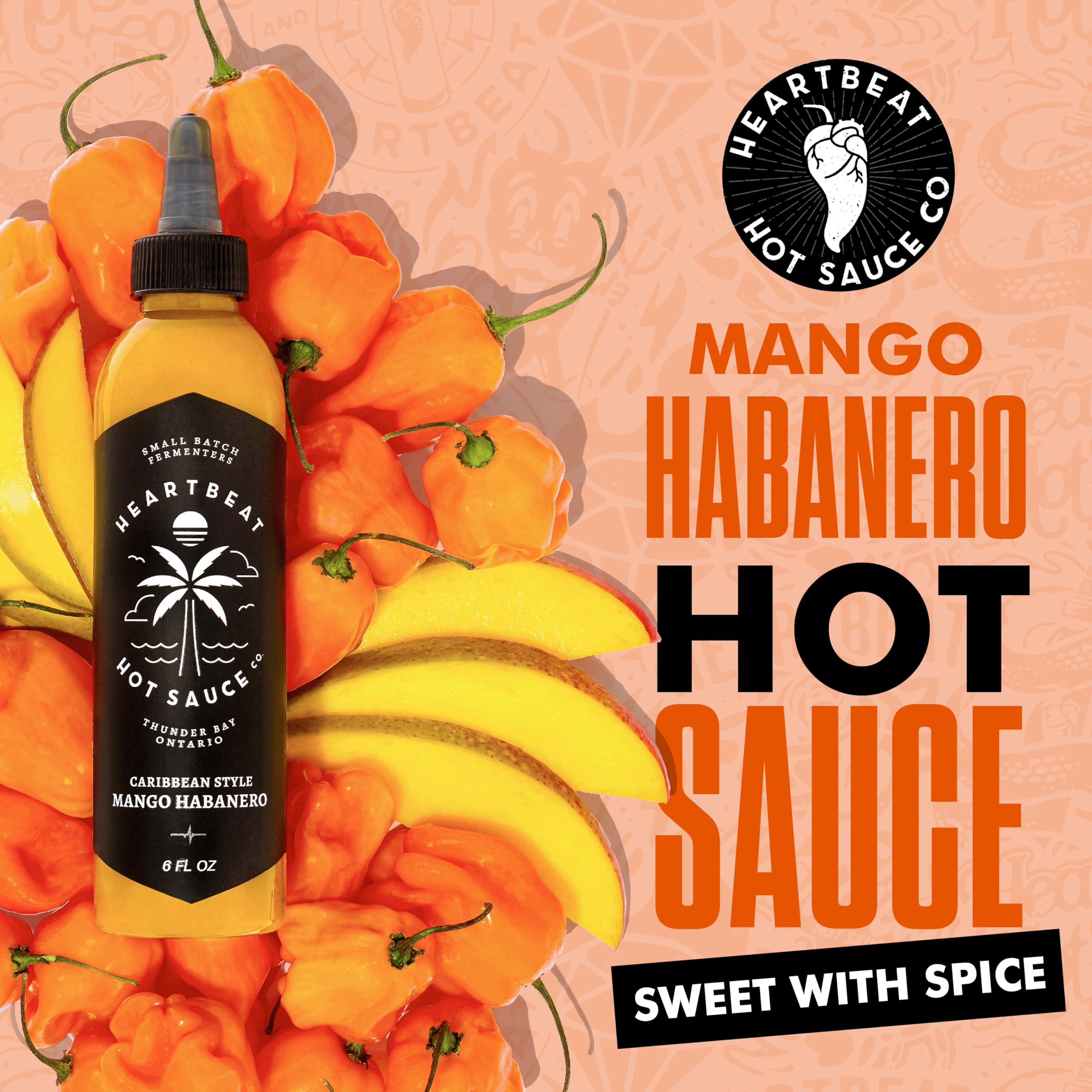 Heartbeat Hot Sauce Co. Mango Habanero on grill setup for seafood and veggies.