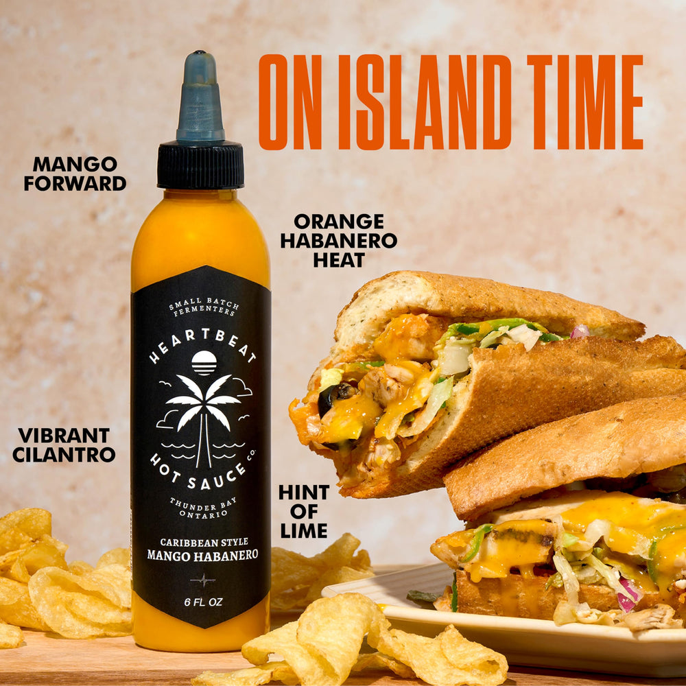 Heartbeat Mango Habanero squeeze bottle, easy drizzle for precise portions.