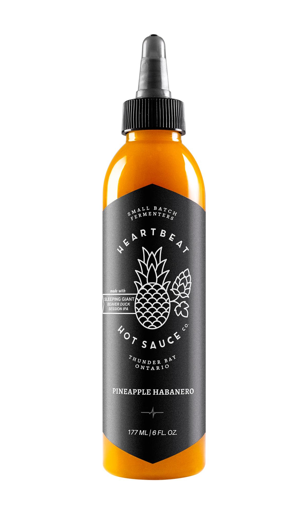 Heartbeat Hot Sauce Co. Pineapple Habanero bottle shows tropical heat and bright aroma.