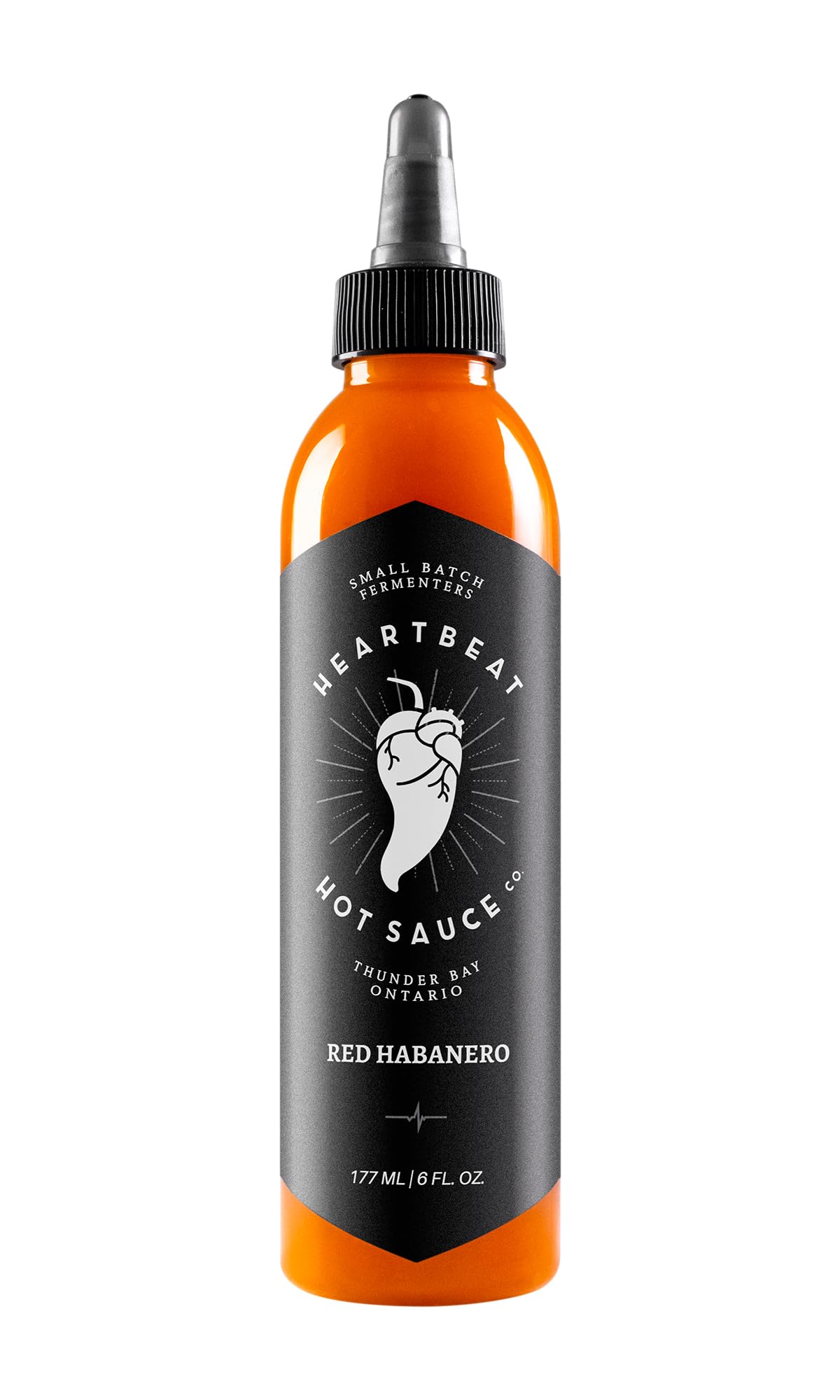 Heartbeat Hot Sauce Co red habanero bottle pour for bold flavor boost