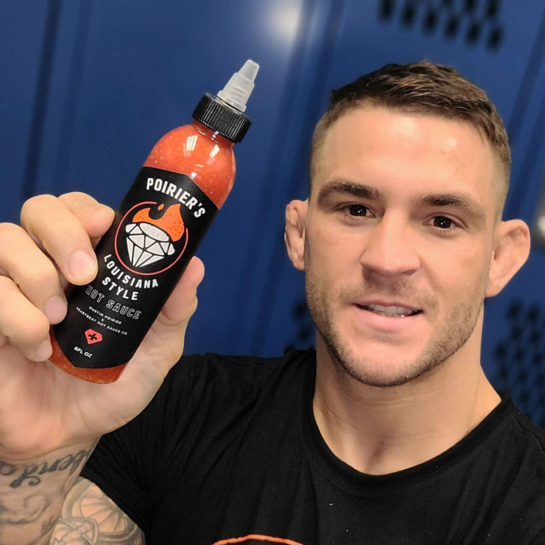 Heartbeat Hot Sauce Poirier kitchen scene suggests versatile everyday cooking use.