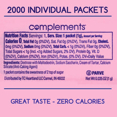 Heartland Complements pink packets beside a tea cup for sugar-free sweetness.