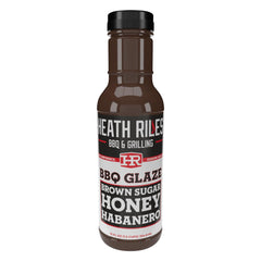 Heathy Riles BBQ glaze bottle showcasing rich sweet-heat glaze for ribs
