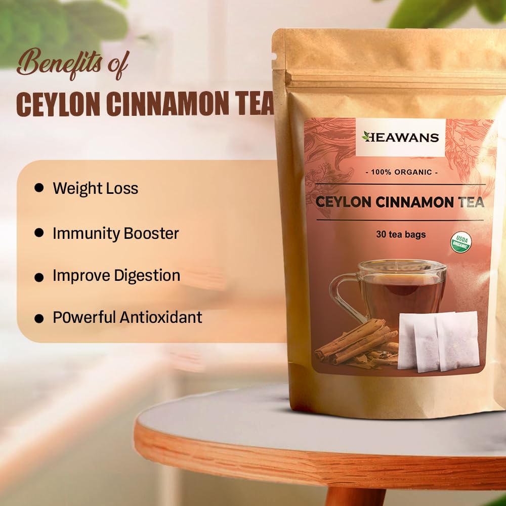 In-hand shot of Heawans tea bags suggests easy daily use.