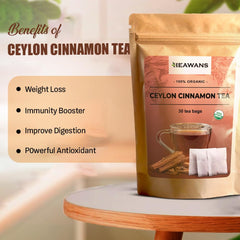 In-hand shot of Heawans tea bags suggests easy daily use.