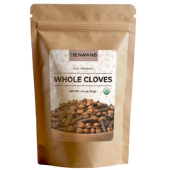 Heawans organic whole cloves in a jar closeup with rich aroma.