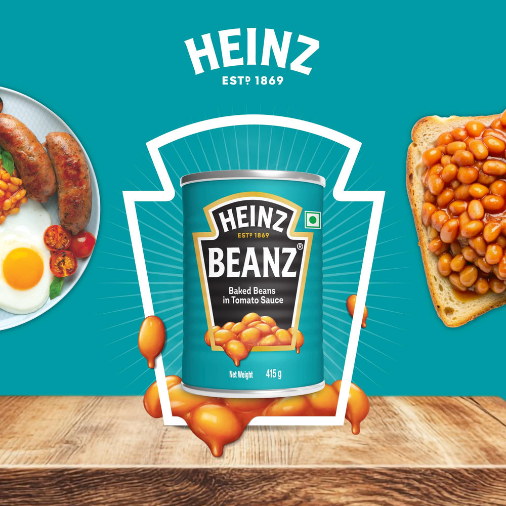 Heinz Beanz pouring tomato sauce, ideal for casseroles and weeknight dinners.