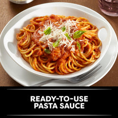 HEINZ Escalon ground tomatoes poured over bowl for thick sauce base